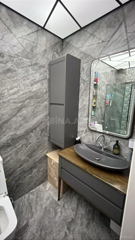 Satılır 4 otaqlı mənzil 146 m²