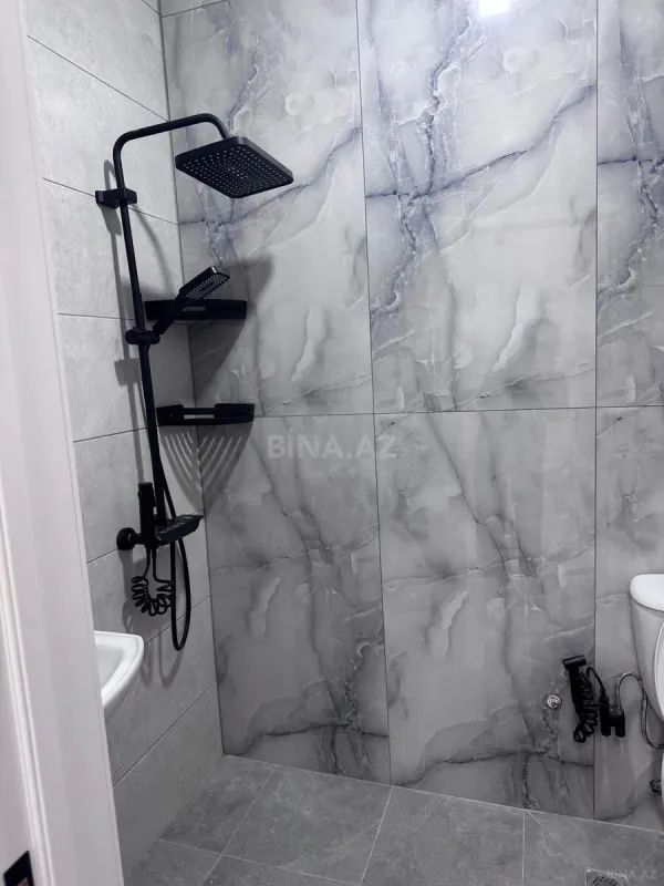 Satılır 2 otaqlı mənzil 56 m²