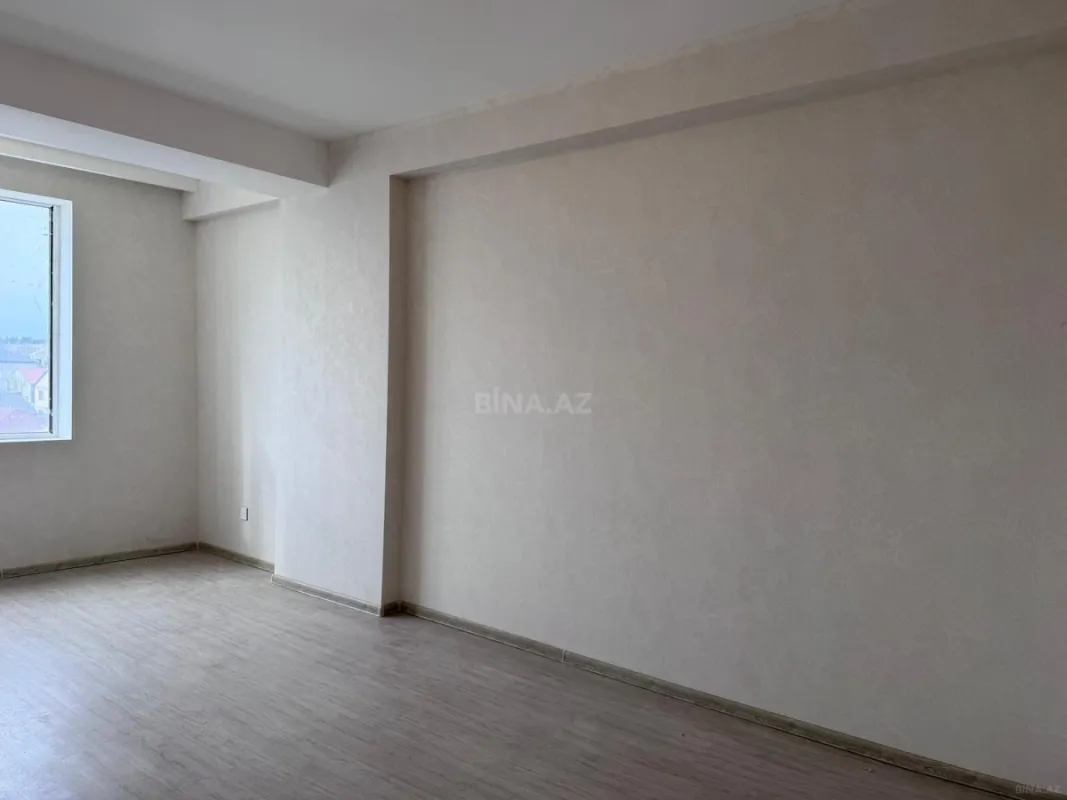 Satılır 2 otaqlı mənzil 56 m²