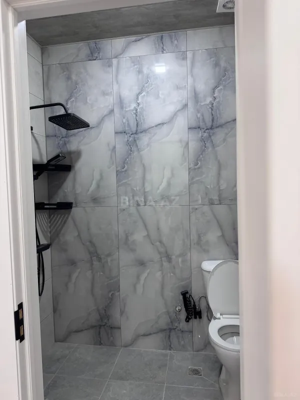 Satılır 2 otaqlı mənzil 56 m²