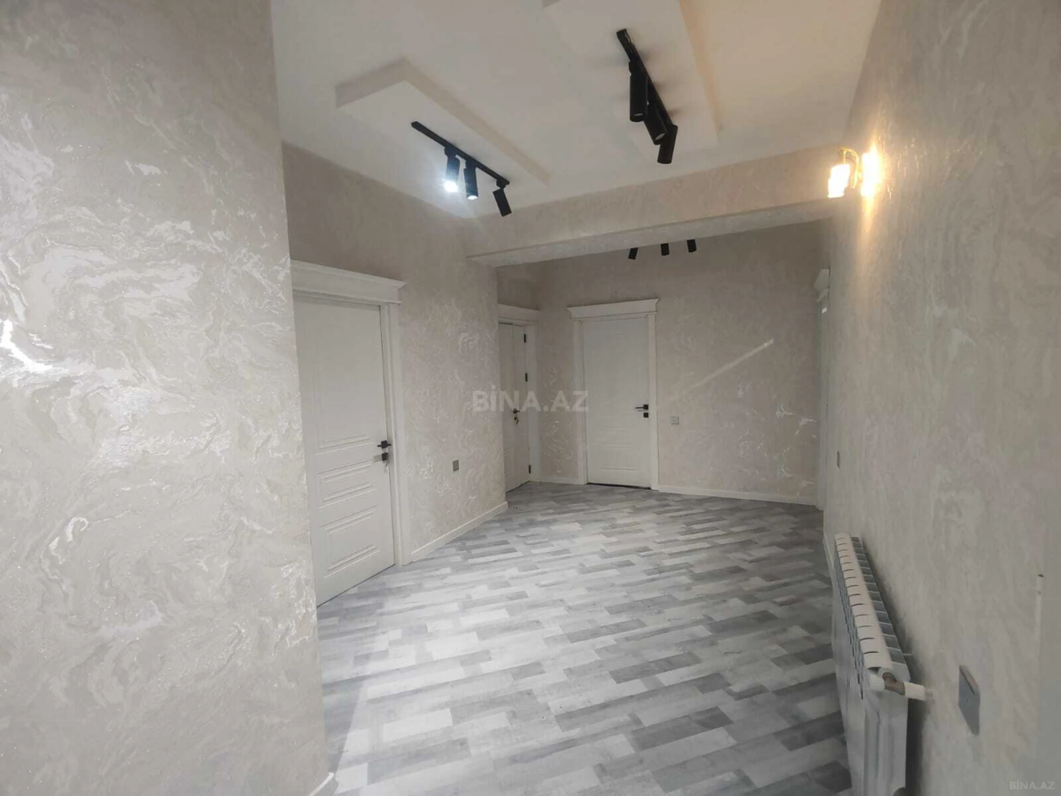 Satılır 4 otaqlı mənzil 165 m²