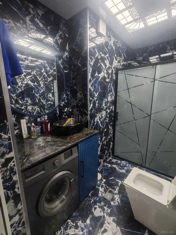 Satılır 4 otaqlı mənzil 165 m²