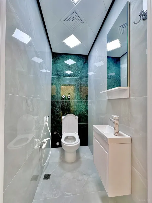 Satılır 4 otaqlı mənzil 136 m²