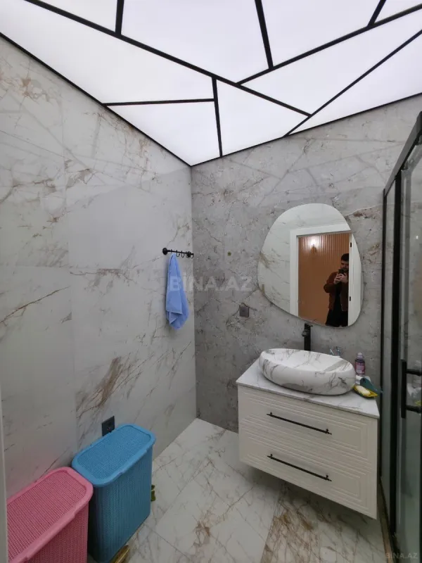 Satılır 4 otaqlı mənzil 130 m²