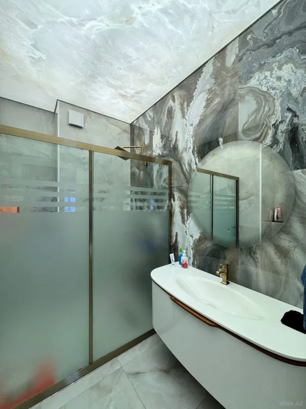 Satılır 4 otaqlı mənzil 165 m²