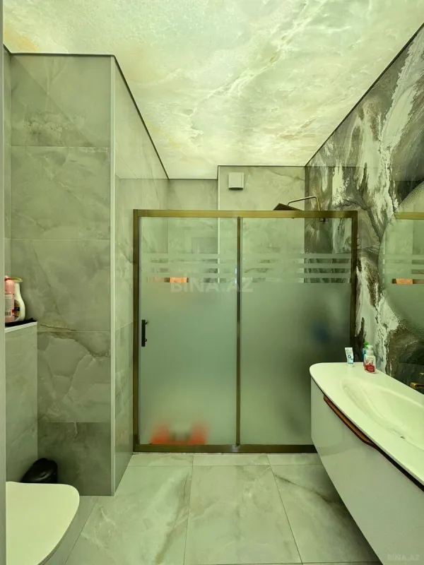 Satılır 4 otaqlı mənzil 165 m²