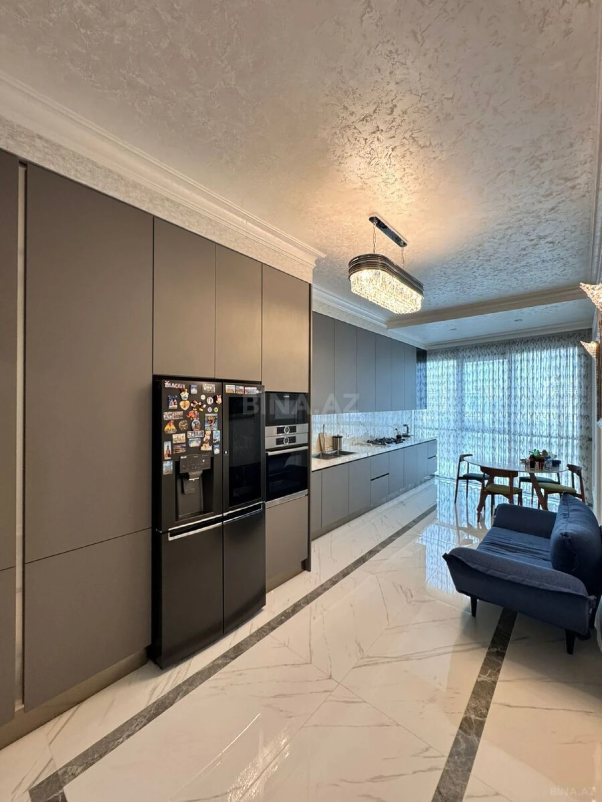 Satılır 4 otaqlı mənzil 165 m²