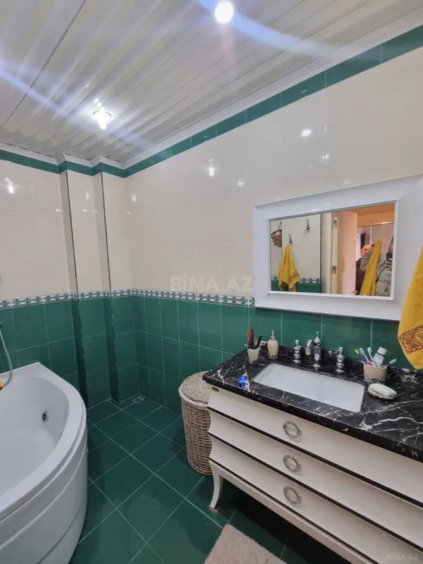 Satılır 4 otaqlı mənzil 170 m²