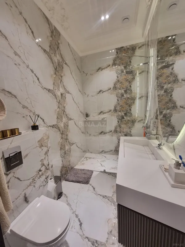 Satılır 4 otaqlı mənzil 150 m²