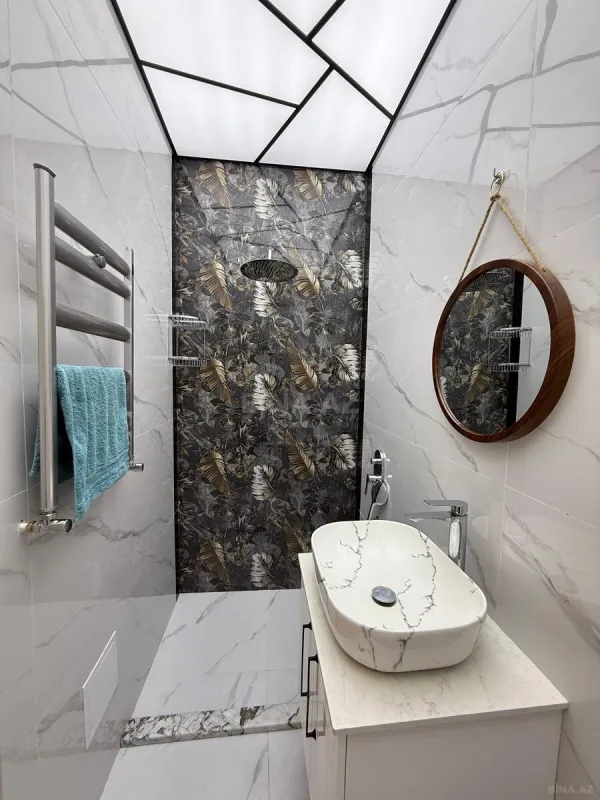 Satılır 4 otaqlı mənzil 142 m²