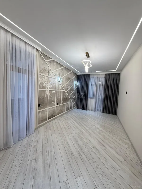 Satılır 4 otaqlı mənzil 142 m²