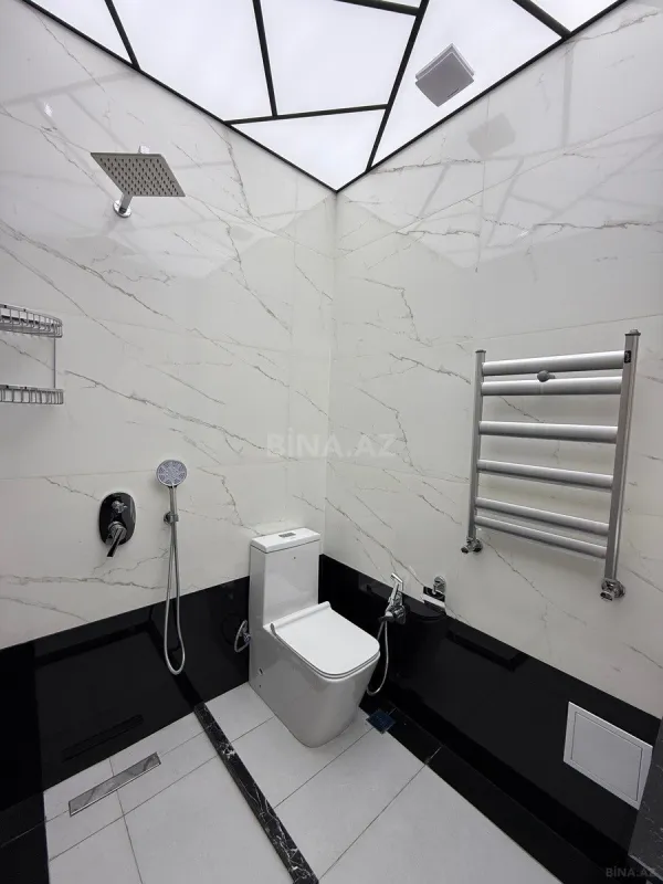 Satılır 4 otaqlı mənzil 142 m²