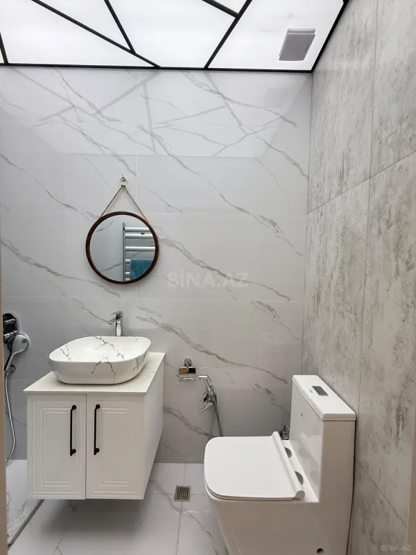 Satılır 4 otaqlı mənzil 142 m²