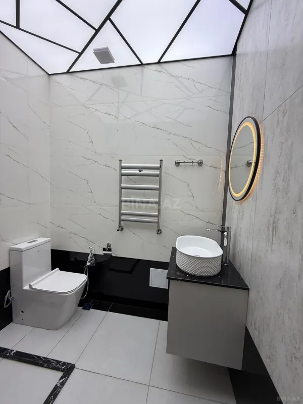 Satılır 4 otaqlı mənzil 142 m²