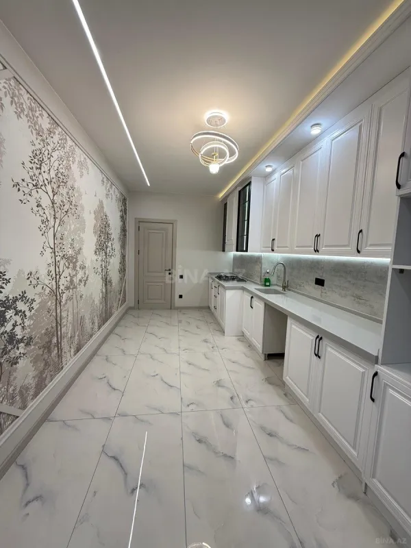 Satılır 4 otaqlı mənzil 142 m²