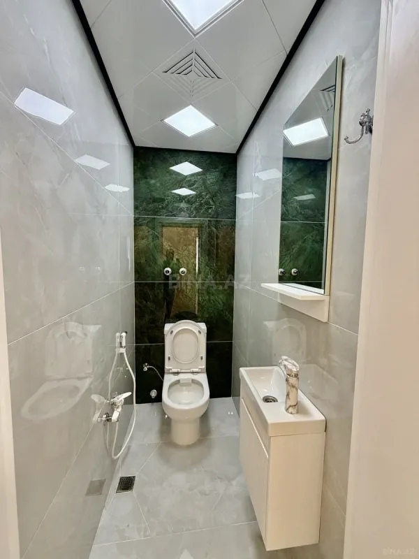 Satılır 4 otaqlı mənzil 135 m²