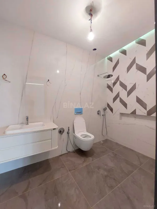 Satılır 4 otaqlı mənzil 225 m²