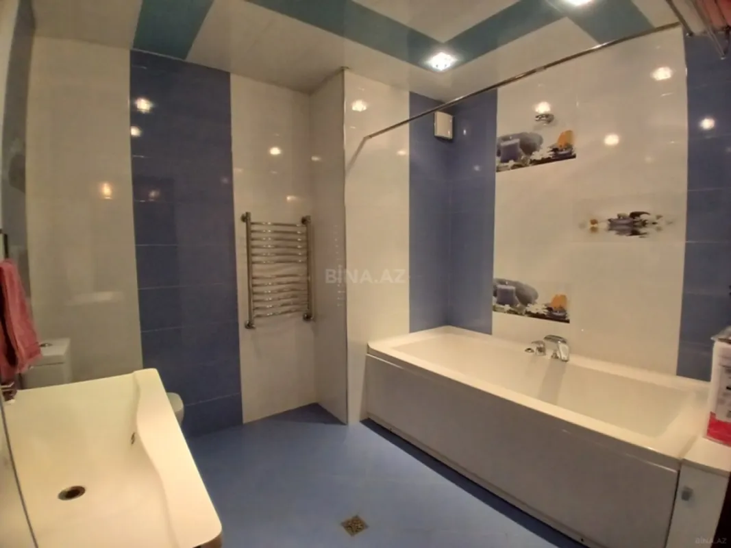 Satılır 4 otaqlı mənzil 162 m²