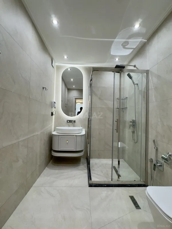 Satılır 4 otaqlı mənzil 165 m²