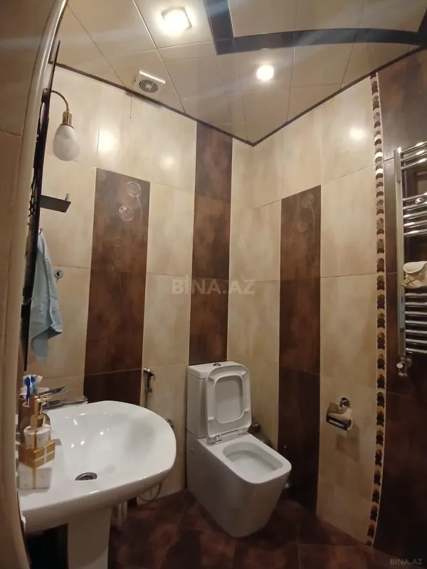 Satılır 3 otaqlı mənzil 118 m²