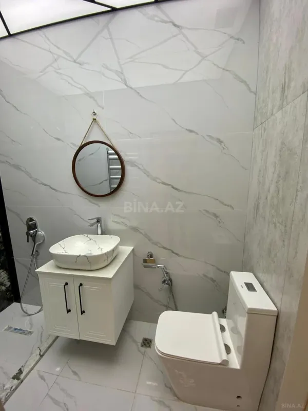 Satılır 4 otaqlı mənzil 150 m²