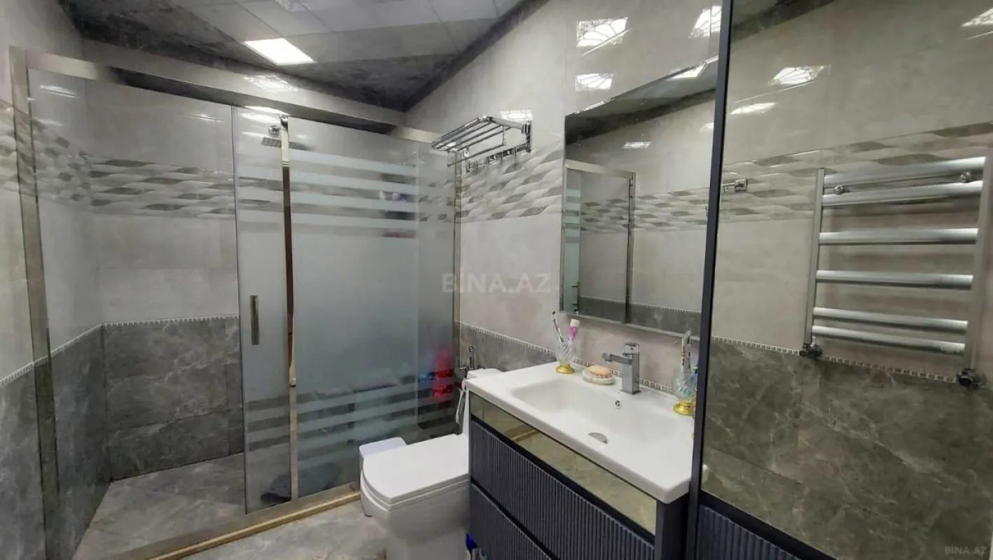 Satılır 3 otaqlı mənzil 165 m²