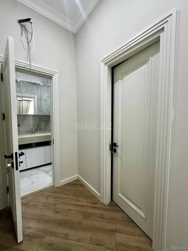 Satılır 4 otaqlı mənzil 148.3 m²