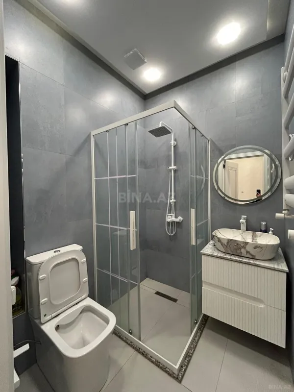 Satılır 4 otaqlı mənzil 155 m²