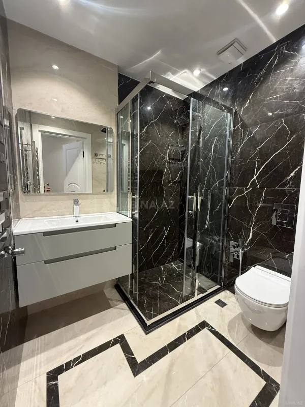 Satılır 4 otaqlı mənzil 171 m²