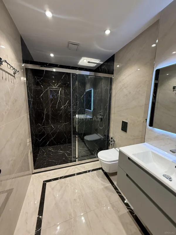 Satılır 4 otaqlı mənzil 171 m²