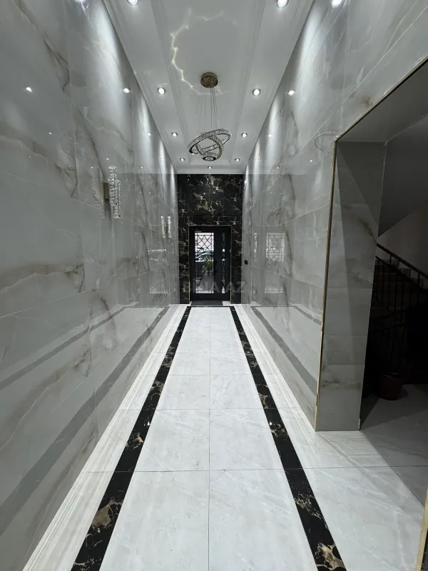 Satılır 4 otaqlı mənzil 166 m²