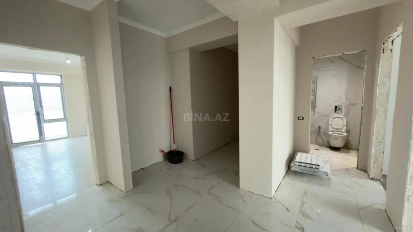 Satılır 4 otaqlı mənzil 121 m²