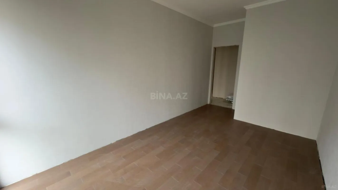 Satılır 4 otaqlı mənzil 121 m²