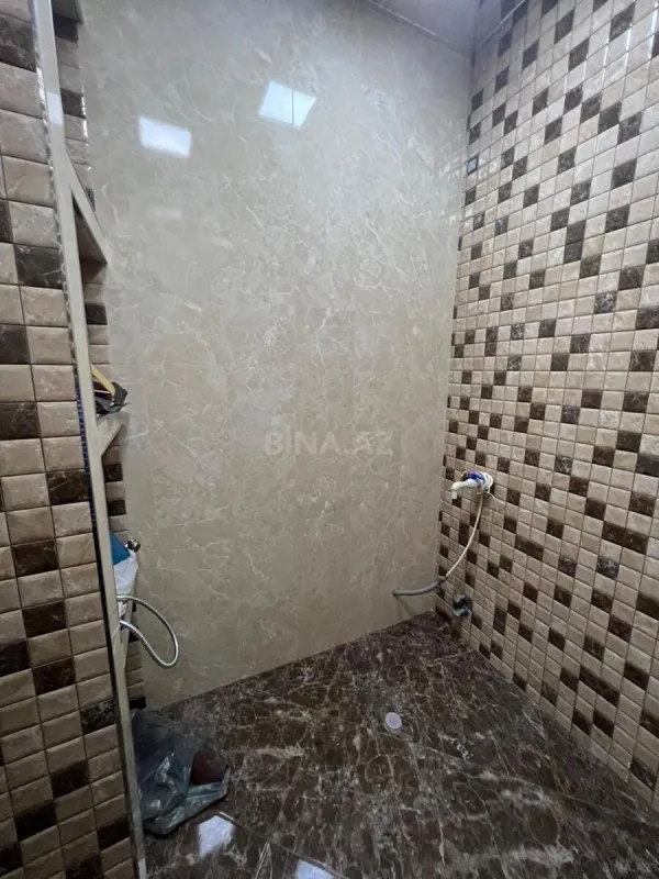 Satılır 4 otaqlı mənzil 157 m²