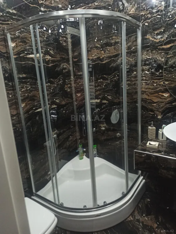 Satılır 4 otaqlı mənzil 147 m²