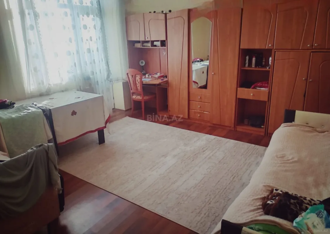 Satılır 4 otaqlı mənzil 126 m²