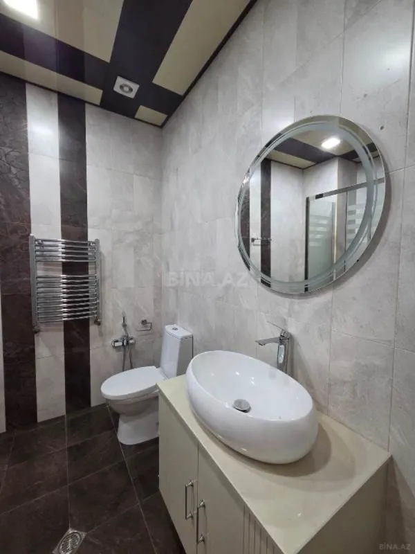 Satılır 3 otaqlı mənzil 134 m²