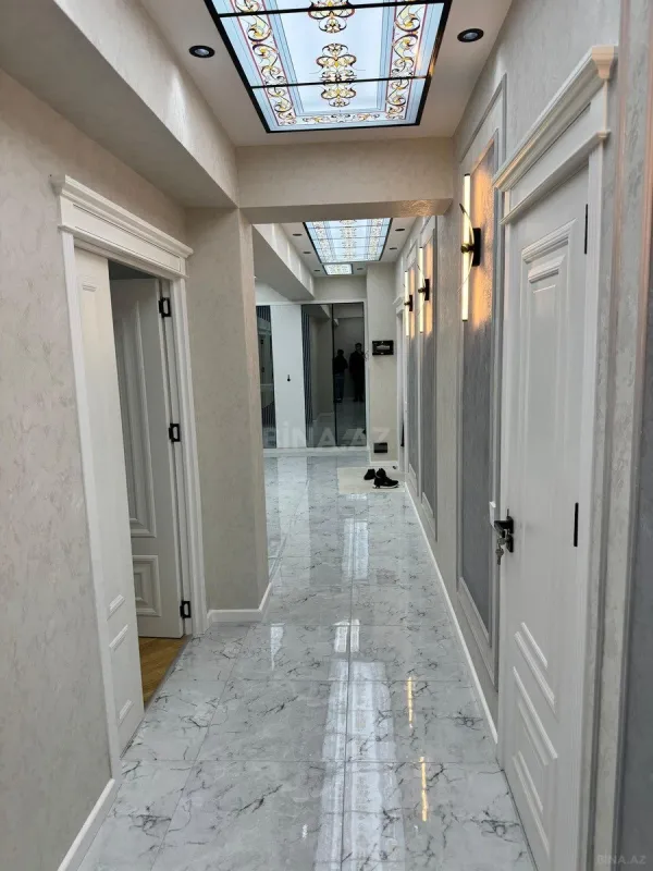 Satılır 4 otaqlı mənzil 153 m²