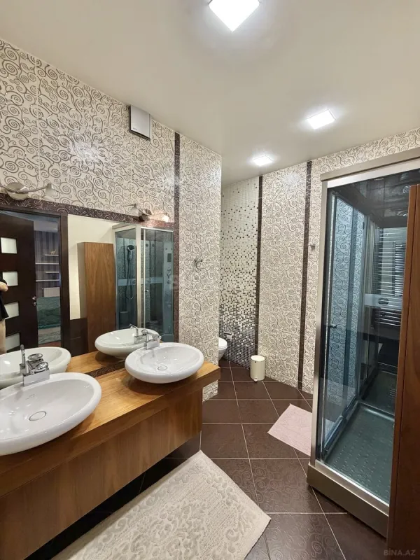 Satılır 8 otaqlı mənzil 412 m²