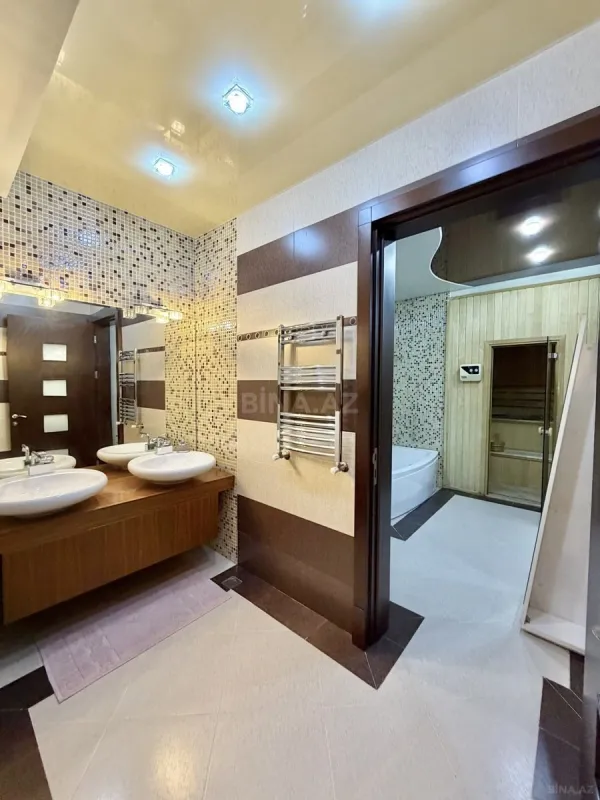 Satılır 8 otaqlı mənzil 412 m²