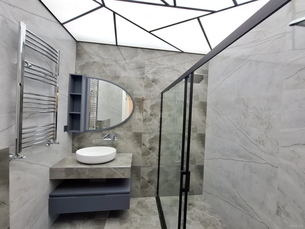 Satılır 4 otaqlı mənzil 140 m²