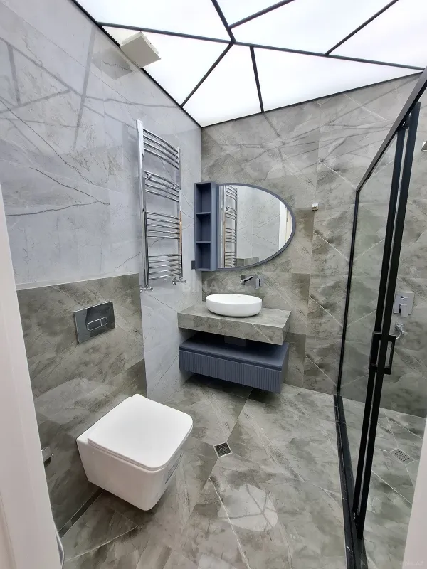 Satılır 4 otaqlı mənzil 140 m²