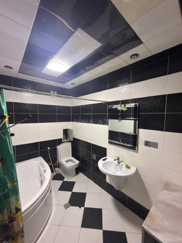 Satılır 4 otaqlı mənzil 165 m²