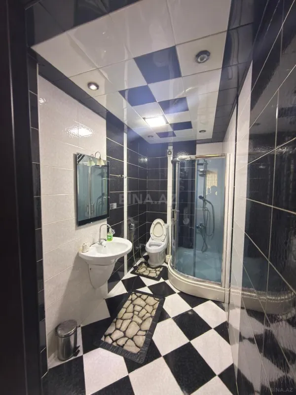 Satılır 4 otaqlı mənzil 165 m²