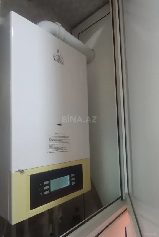 Satılır 4 otaqlı mənzil 136 m²