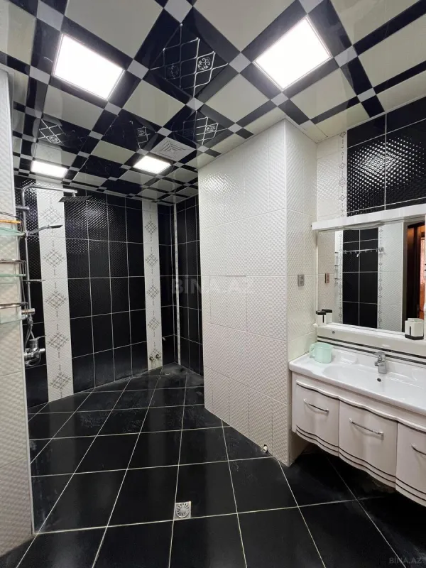 Satılır 4 otaqlı mənzil 165 m²