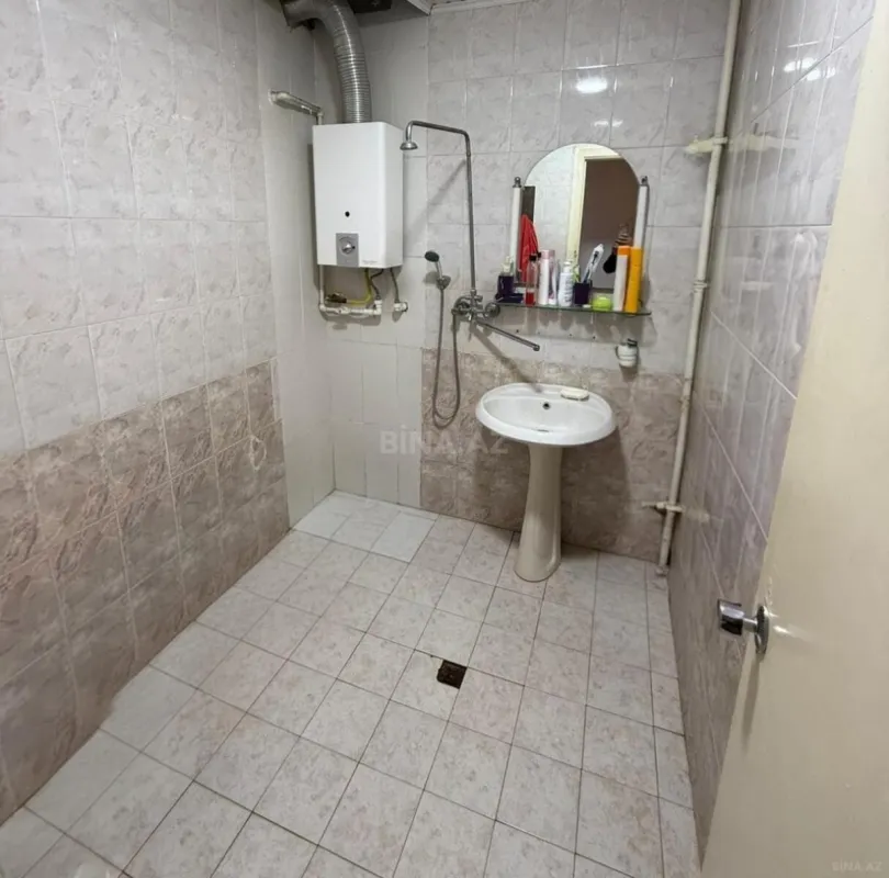Satılır 4 otaqlı mənzil 115 m²