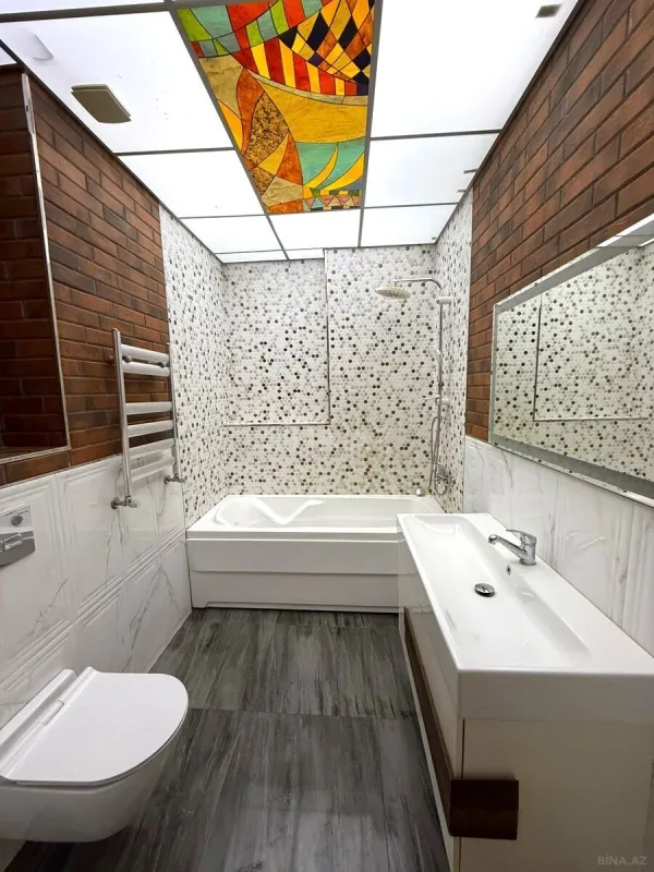 Satılır 3 otaqlı mənzil 116 m²