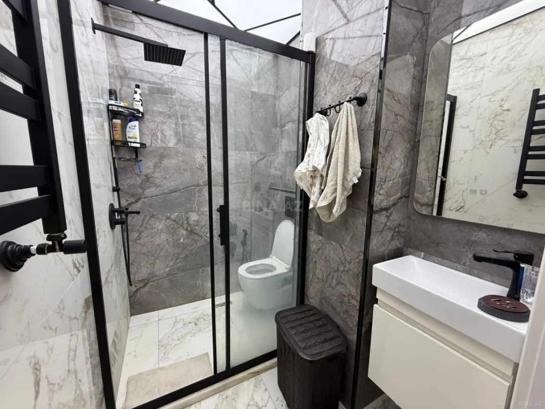 Satılır 4 otaqlı mənzil 131 m²