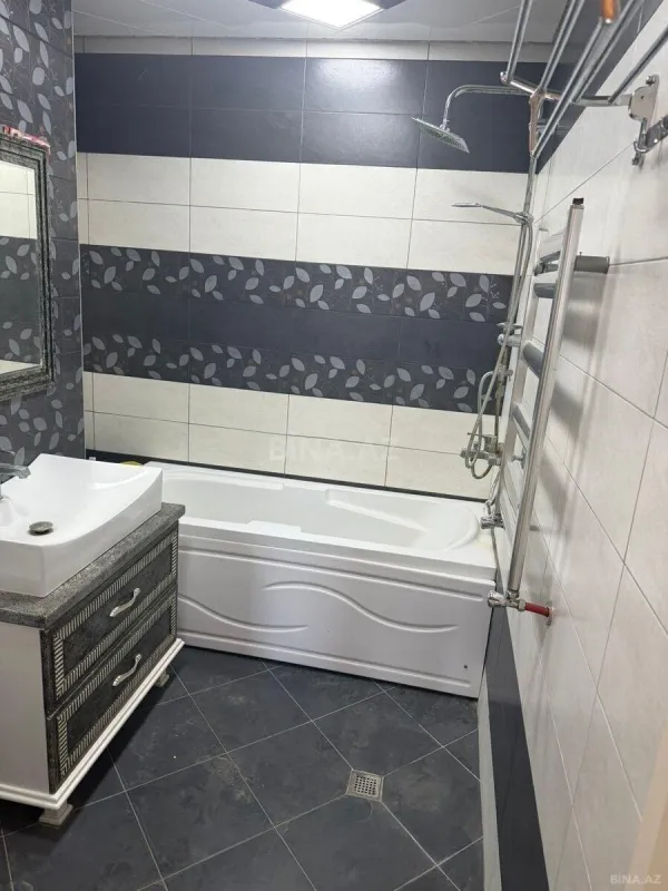 Satılır 4 otaqlı mənzil 191 m²